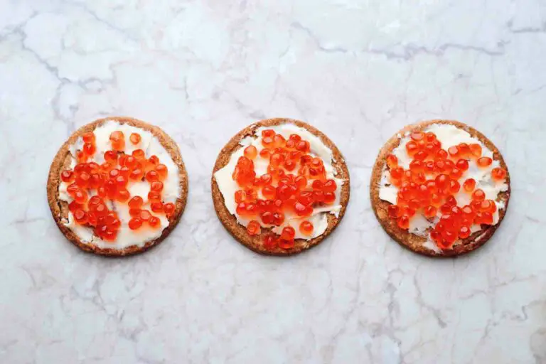 Red caviar on biscuits