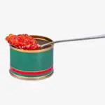 A spoon of red caviar